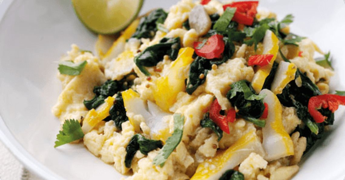 Curried scrambled eggs with spinach and smoked haddock