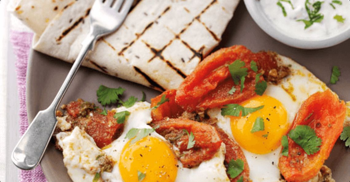 Moroccan spiced eggs and tomatoes with a minted yoghurt