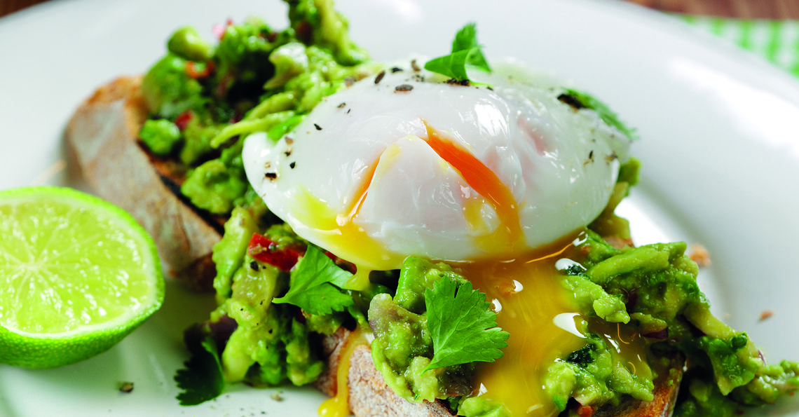 Eggs and guacamole on toast