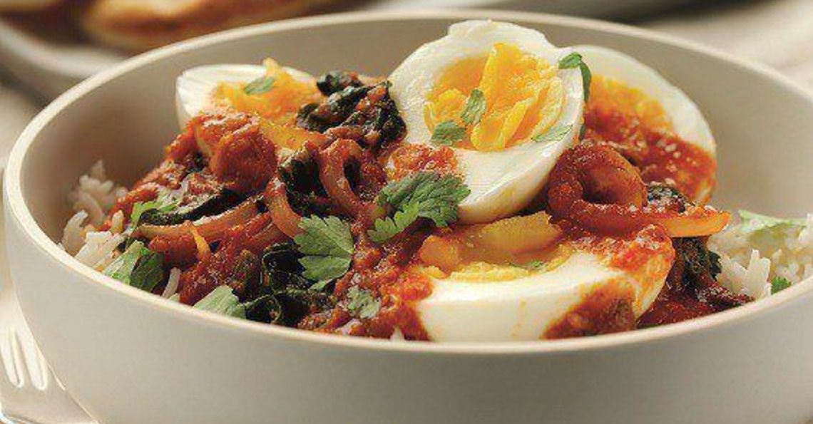 Fiery egg and spinach curry