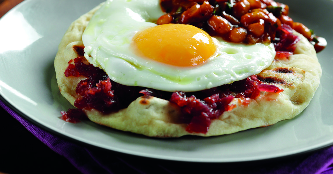 Fried egg naan with masala beans