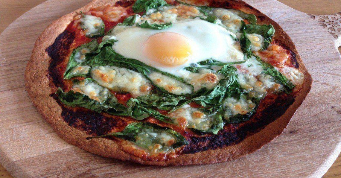 Spinach and egg tortilla pizza