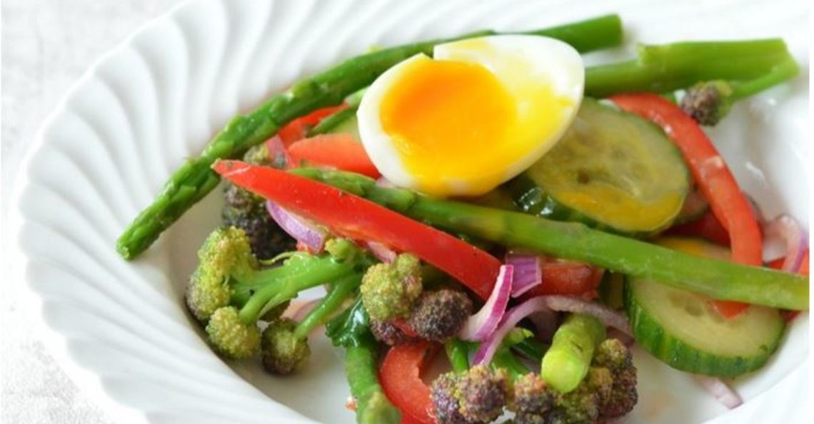 Soft boiled egg and seasonal vegetable salad
