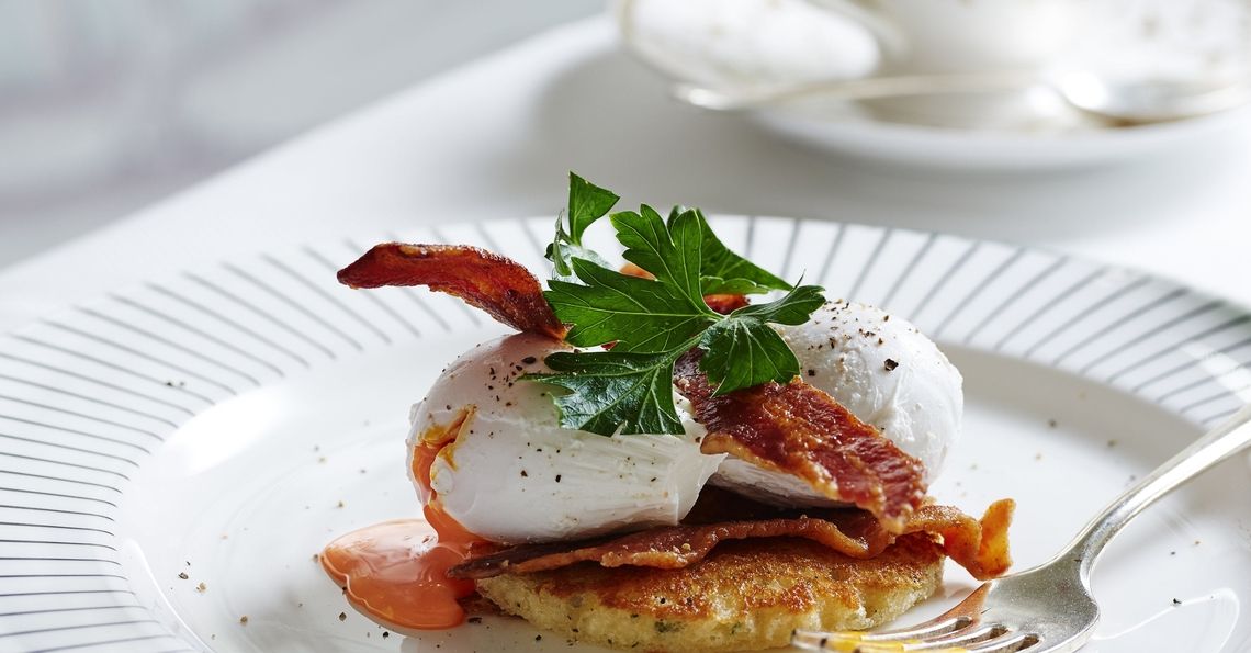 Soft poached eggs with sweetcorn pancake and crispy pancetta