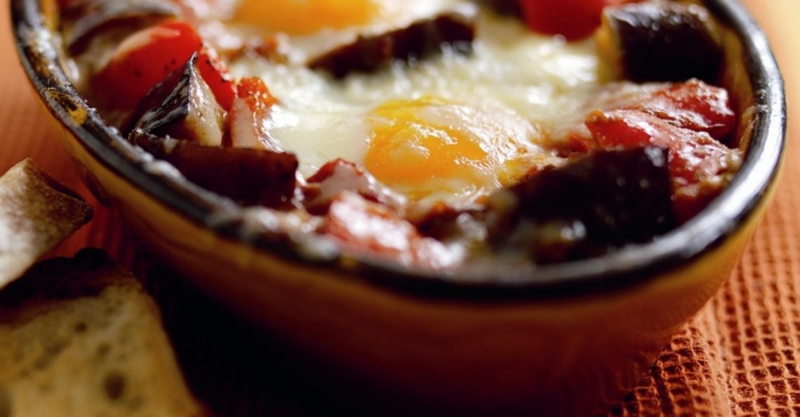 Aubergine and tomato baked eggs