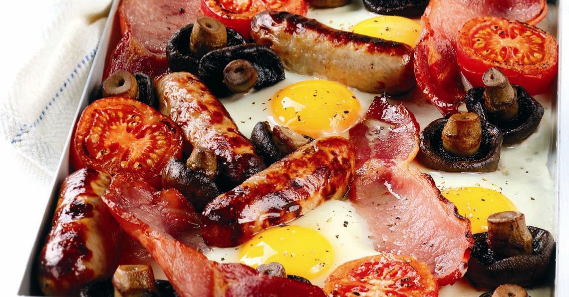 Baked breakfast with tomato and mushroom