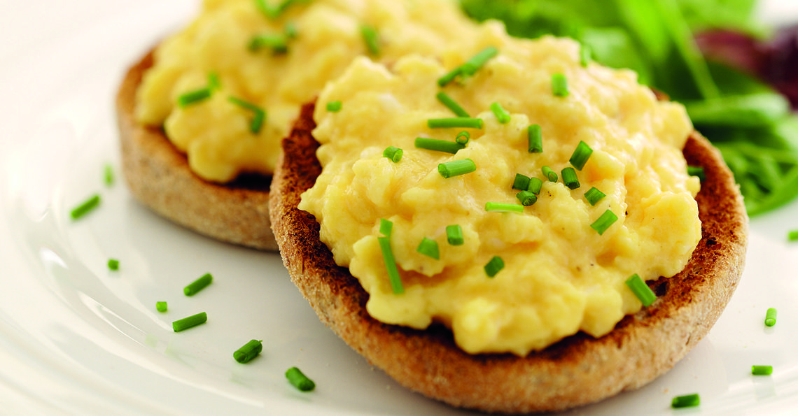 Scrambled eggs on toasted wholemeal muffins