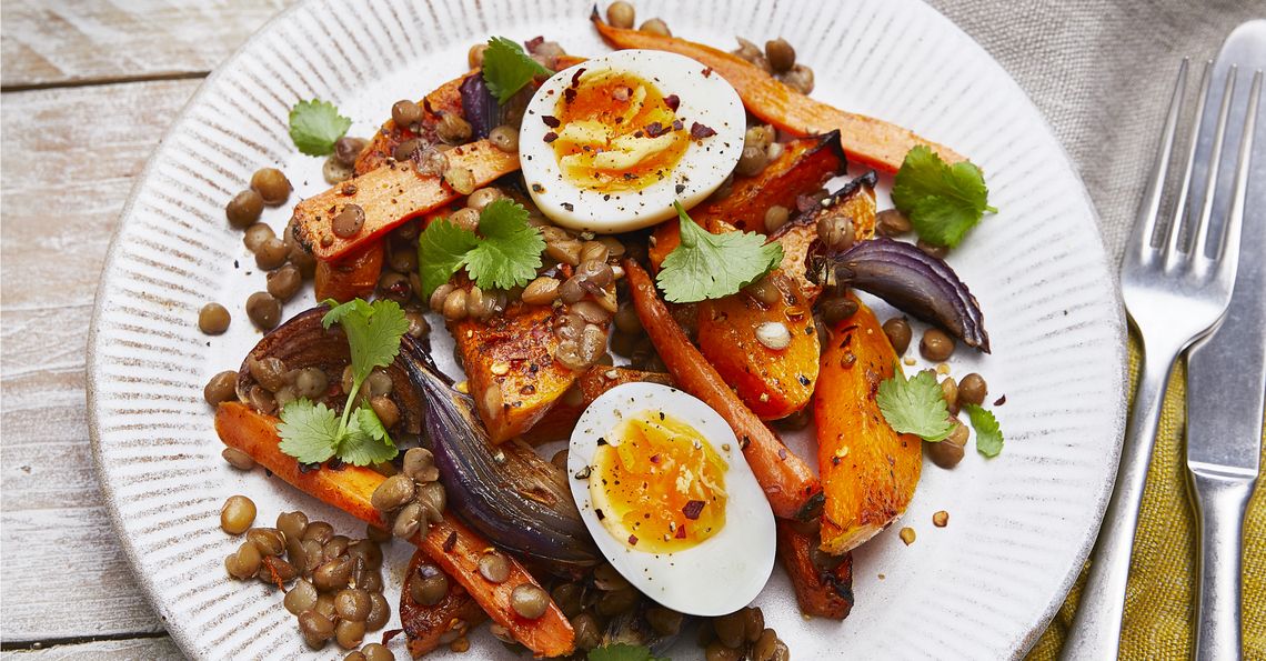 Spicy roast vegetables and lentils with boiled egg
