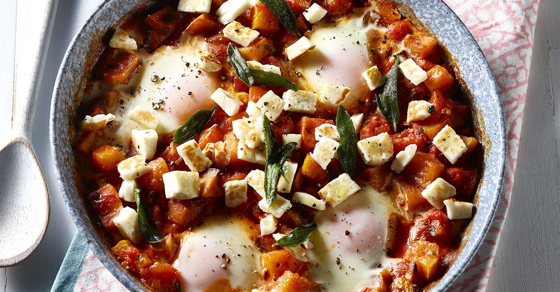 Pumpkin shakshuka with baked eggs and halloumi