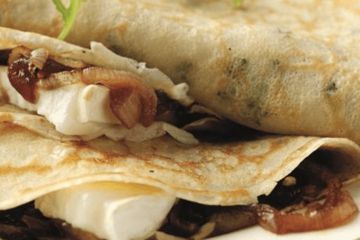 Thyme pancakes filled with caramelised onion chutney and goats cheese