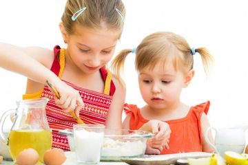 Children making an egg recipe