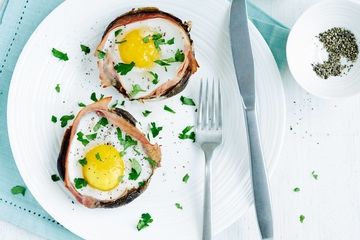 Baked eggs and ham in Portobello mushrooms