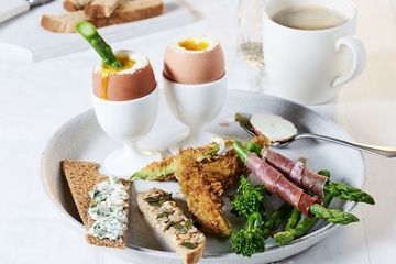 Dippy eggs with breaded avocado