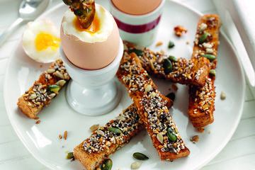 Crunchy seeded soldiers and soft boiled eggs