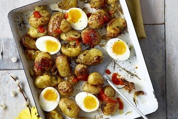 Crispy breakfast potatoes with soft boiled eggs