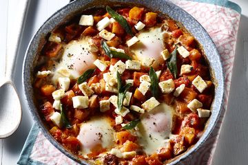 Pumpkin shakshuka with baked eggs and halloumi